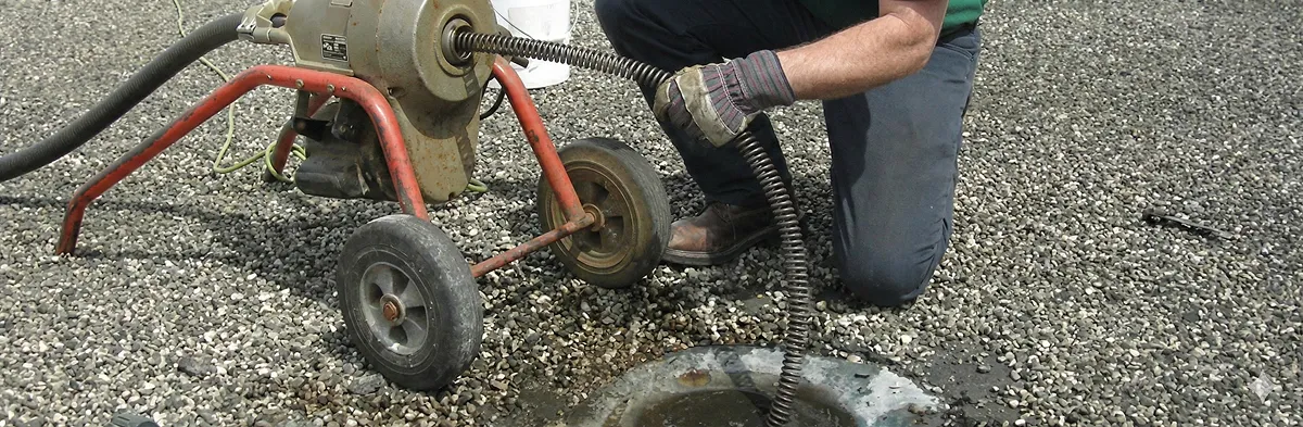 sewer rodding technician actively removing blockages from a sewer line in Cincinnati, OH