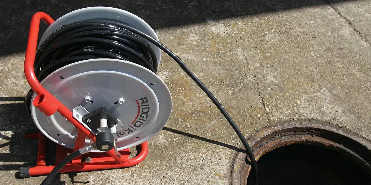 sewer rodding equipment prepared to clear clogged sewer lines in Cincinnati, OH